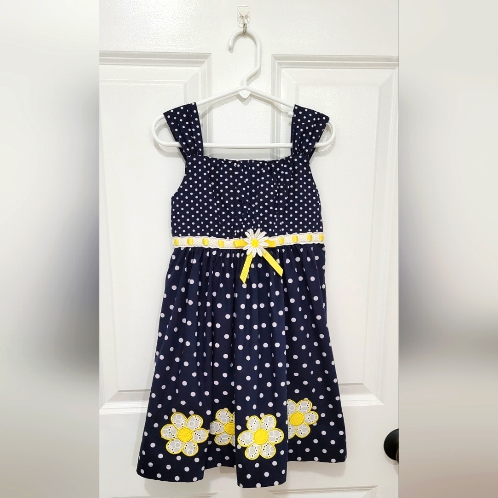 Girls size 6 navy blue polkadot dress with daisies